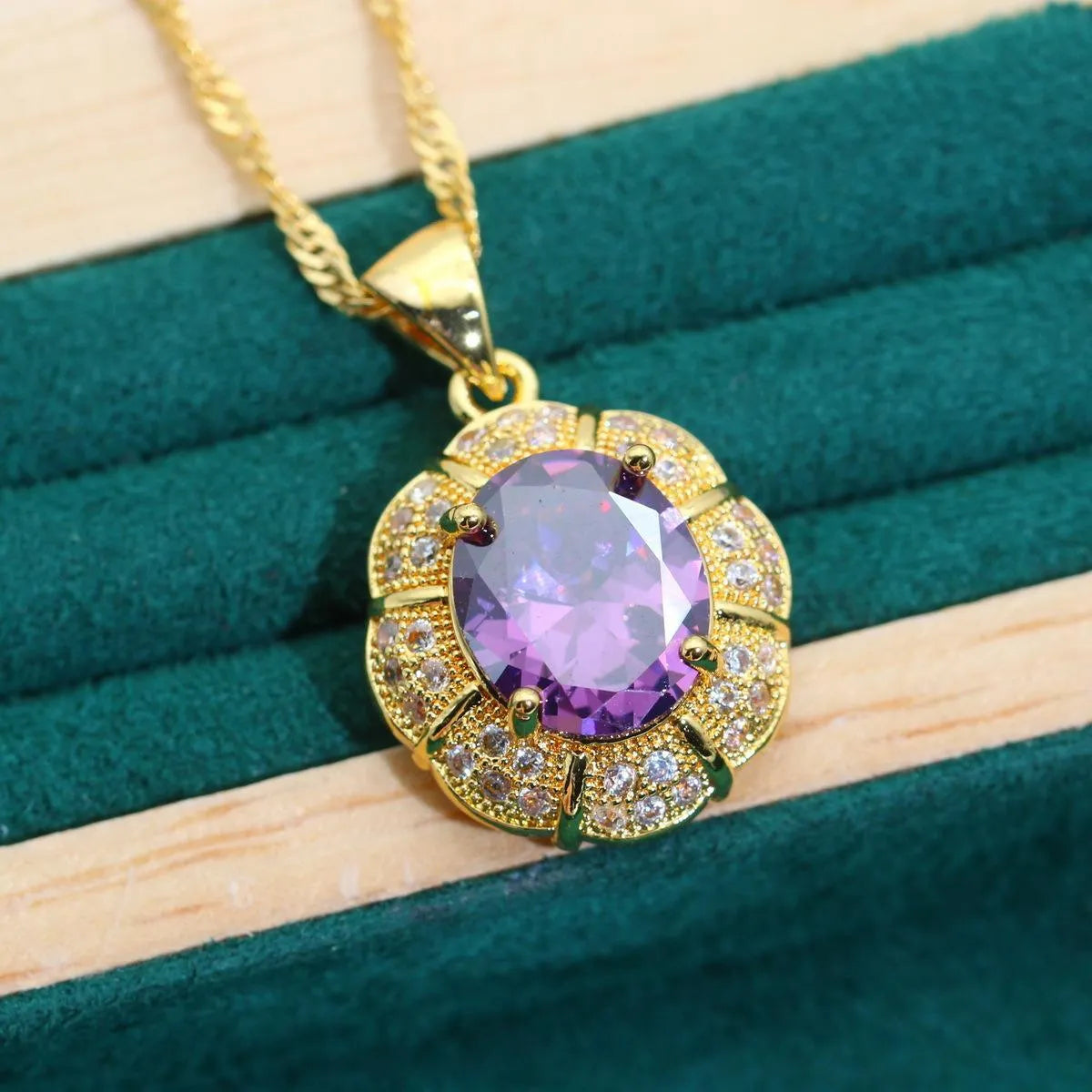 Complete 18k gold plated jewellery set with colourful zircon stones, showing necklace, earrings, ring, and bracelet.