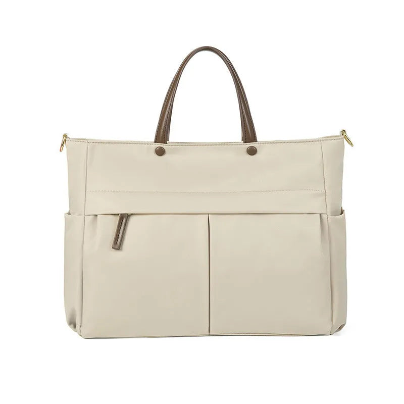 Women's Oxford cloth laptop bag in elegant black or nuts and apricots colours with contrast stitching