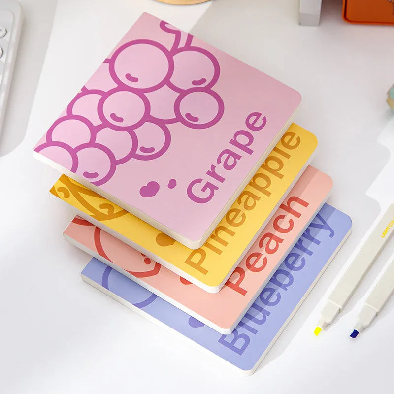 Square fruit design notebook with 14.5cm sides showing colour-embossed cover options.