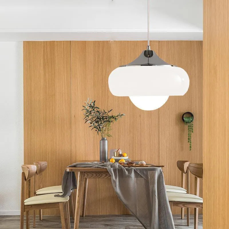 Bauhaus retro style glass pendant ceiling light with three egg tart shaped shades in milk white finish.