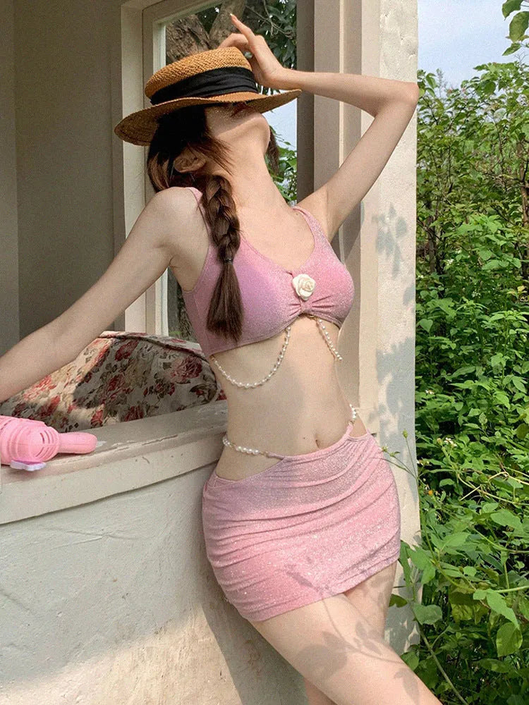 Polyester three-piece bikini swimsuit set in black or pink colours with briefs style design