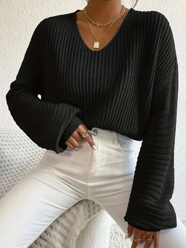 Women's solid colour long sleeve pullover in loose casual fit, shown in available colour options.