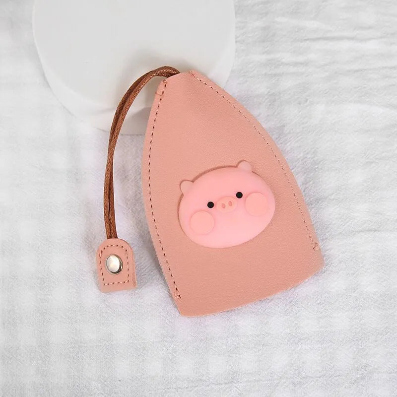 Cartoon pull-out key case in PU leather measuring 14 by 7.5 centimetres