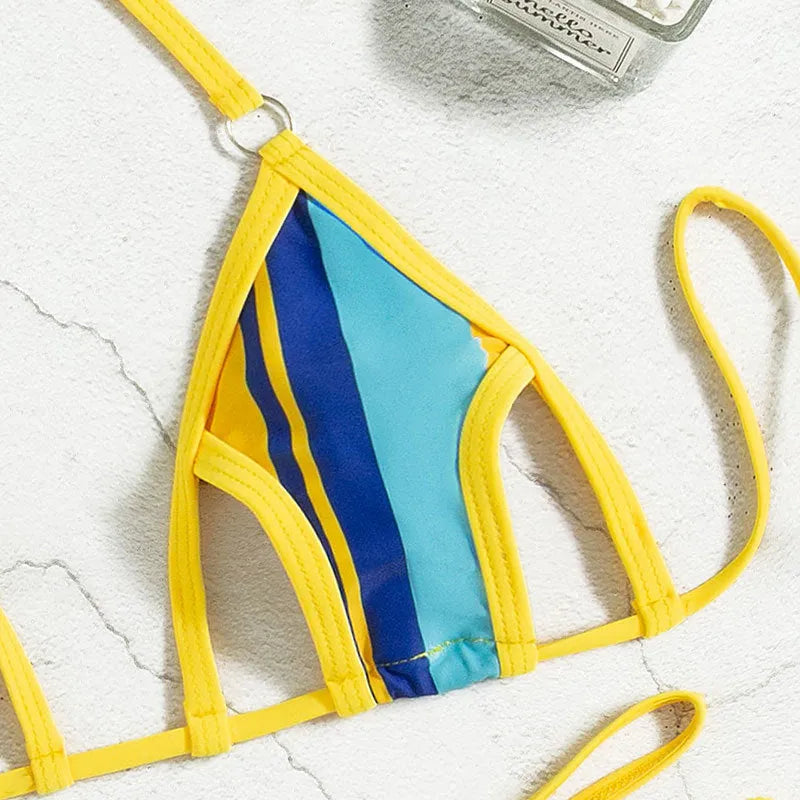 Yellow women's split swimsuit with neck-hanging style and hollow back design