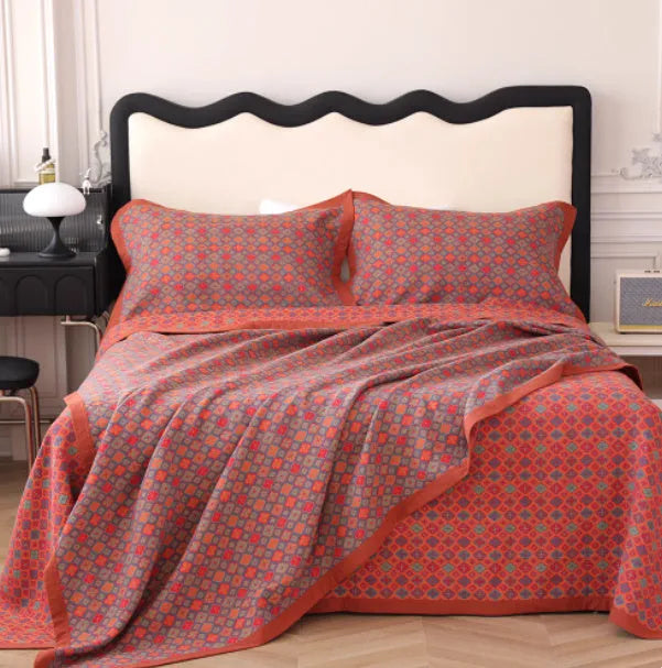 Cotton gauze bed blanket three-piece set with floral plant pattern showing blanket and two pillowcases