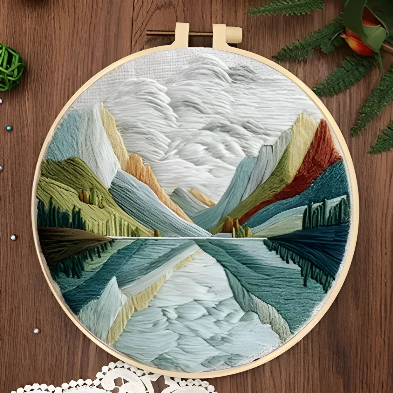 Embroidery DIY kit with landscape-printed cotton fabric, thread, needles, and a 15cm bamboo-style frame.