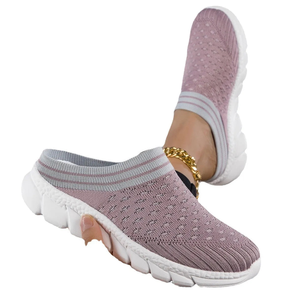 Black women's Flyknit sports slipper with hollowed-out pattern and striped design on a light background.