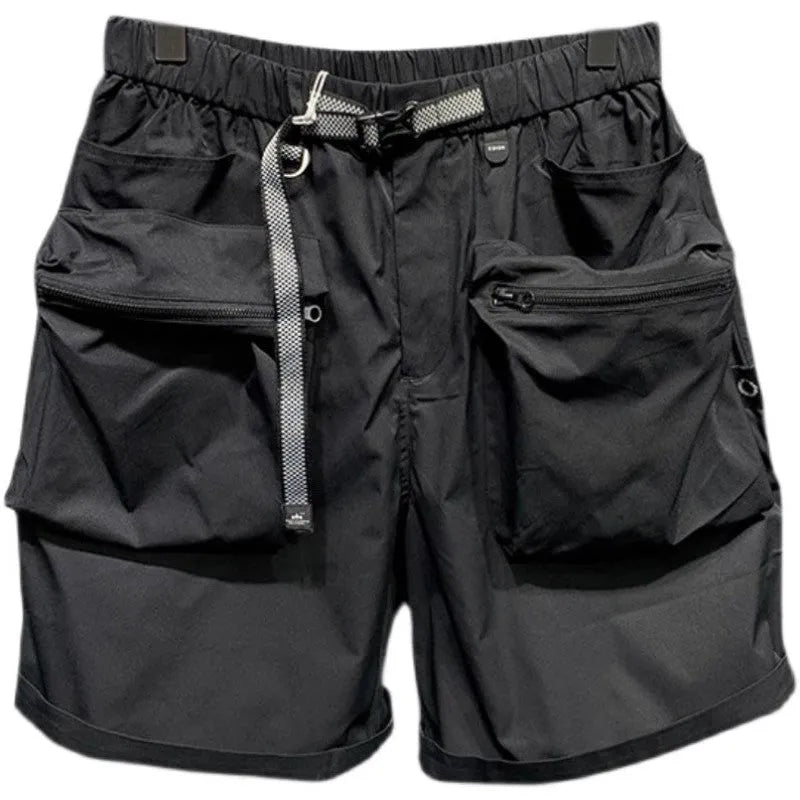 Men's black loose fit work shorts with pockets and straight leg hem above knee length