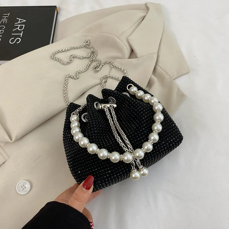 Diamond detailed PU leather crossbody bag with chain strap in bucket shape design
