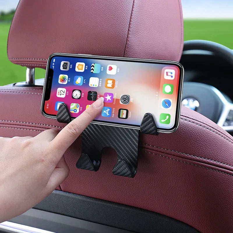 Black ABS plastic car hook with integrated phone holder bracket for rear seat organisation.