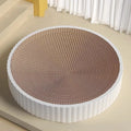 Round green cat scratching board with replaceable corrugated centre measuring 55 cm diameter