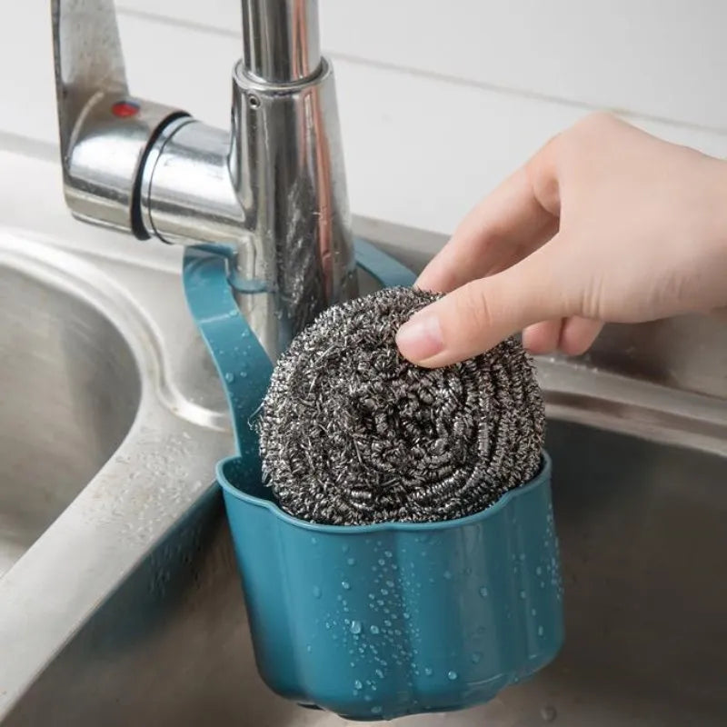 Plastic sink drain basket in dark blue colour showing 20cm length and 10cm width dimensions
