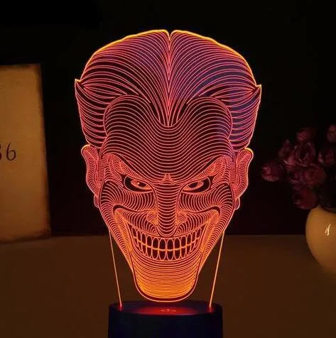 3D acrylic LED lamp showing colourful illumination on a square base, with remote control and USB cable