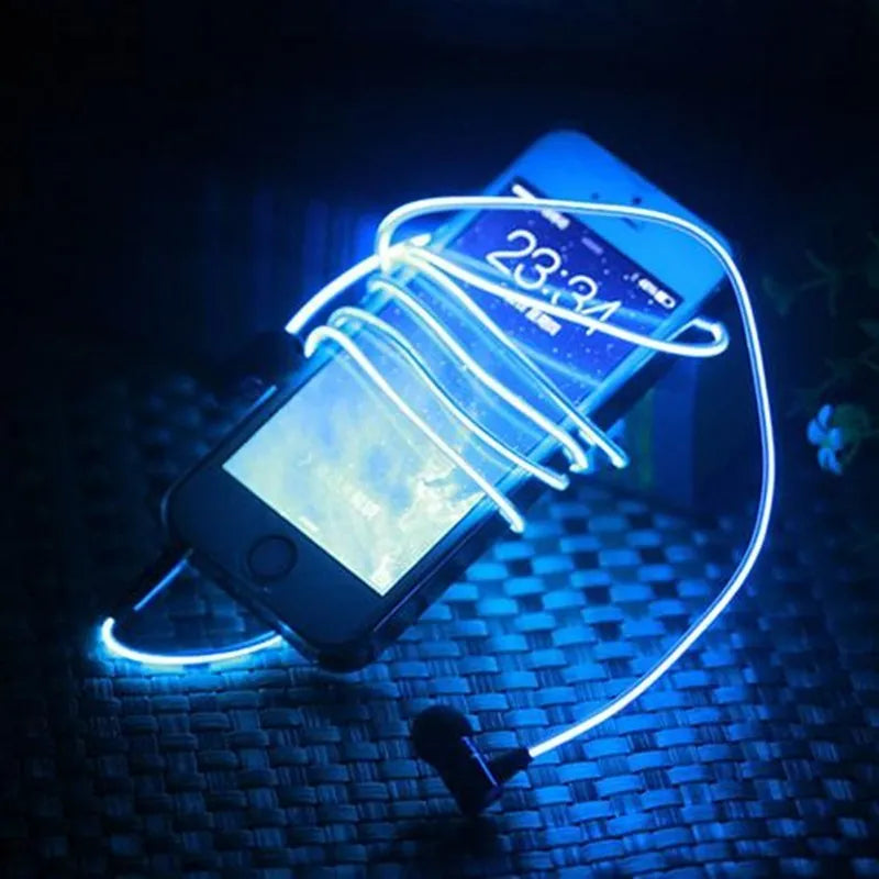 Blue Magic Light LED earphones with glowing stems, 3.5mm plug, and inline remote on a dark background.