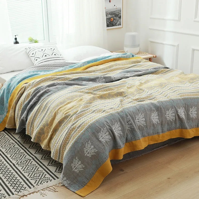 Pure cotton five-layer gauze bed blanket in roulette wheel blue pattern, shown in modern simple style.