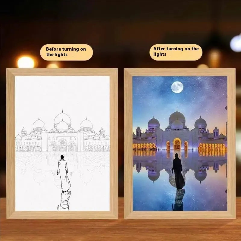 Modern rectangular LED light painting frame showing a sea and home scene on a wall.