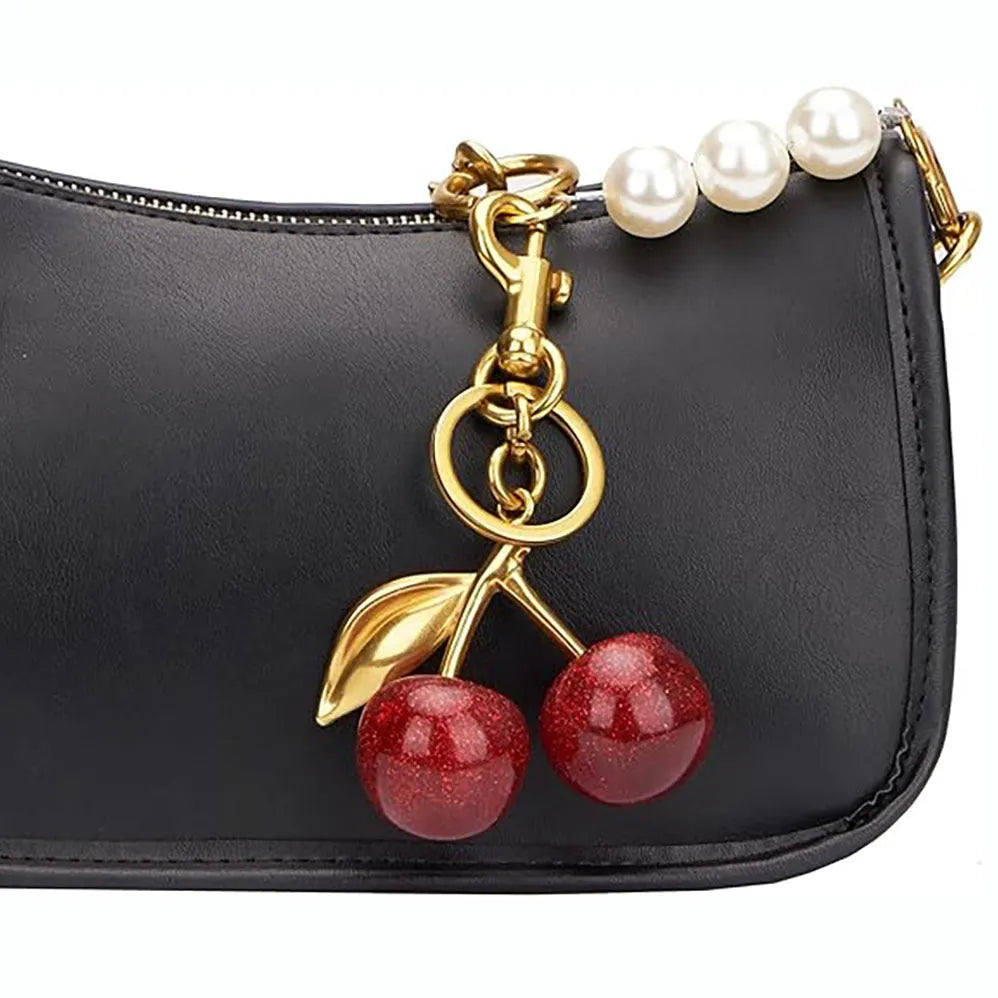Red zinc alloy cherry pendant keychain with three-dimensional design