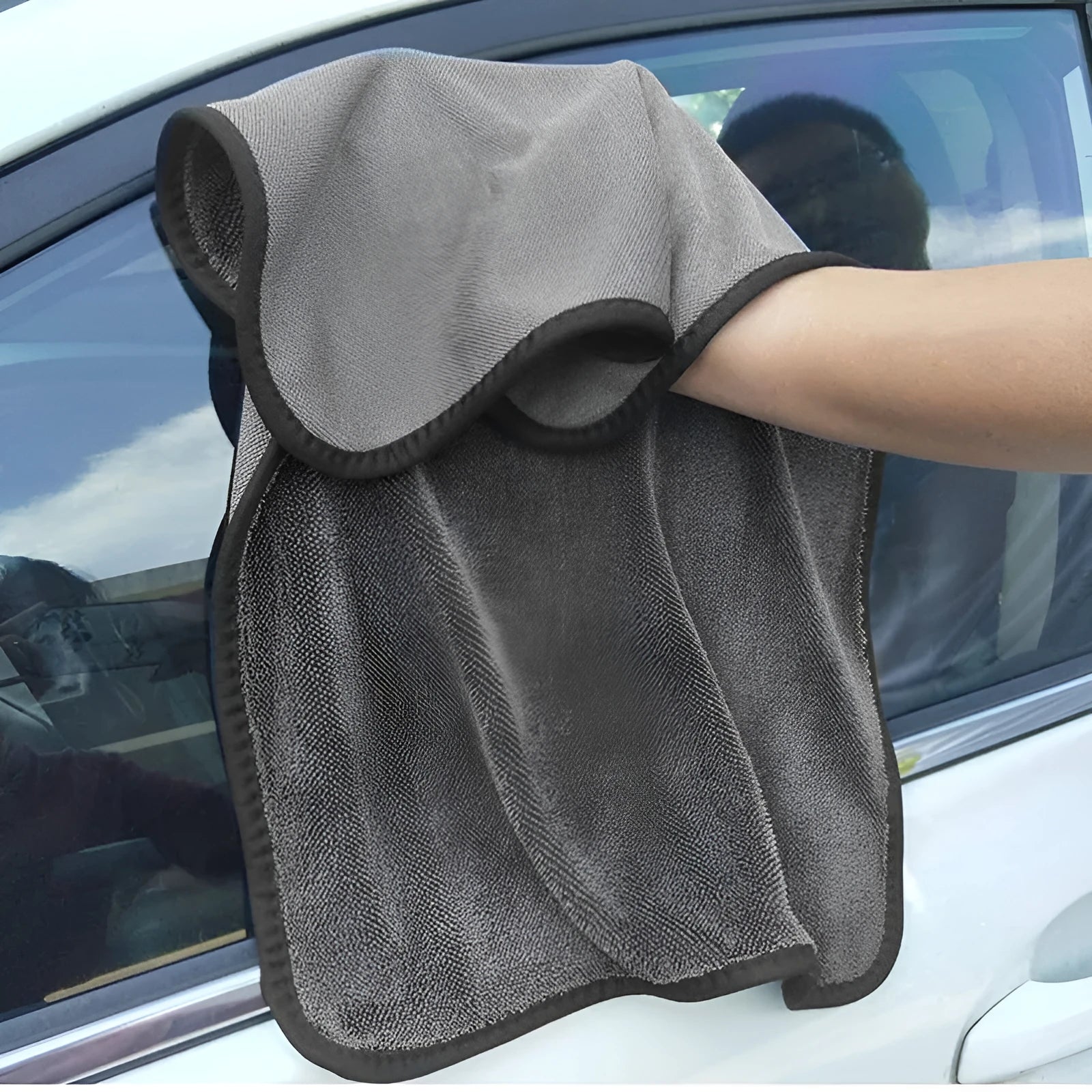 Grey 40x40cm microfiber car wash and drying towel laid flat.
