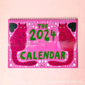 Cat-themed wall calendar planner for 2024 or 2025 year on paper