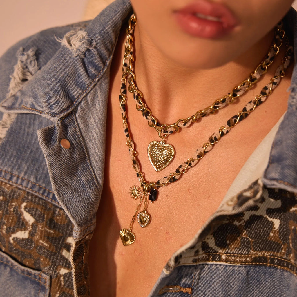 Women's stainless steel necklace with geometric leopard pendant and adjustable chain