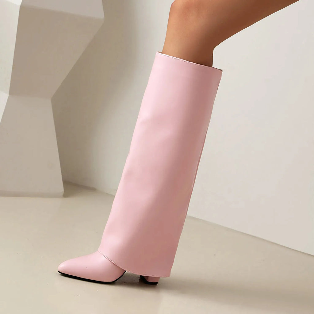 Women's black thick high heel ankle boots with sewing line detail on a white background