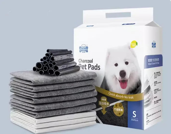 Pack of adhesive-backed dog urine pads showing size comparison between S, M, L and XL options