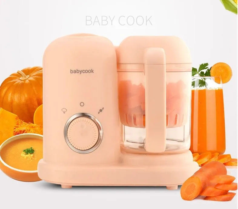 Green and pink baby food processor with steamer and blender functions, showing double mixing blades.
