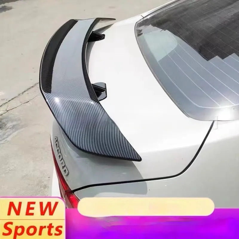 Universal punch-free car spoiler in ABS plastic showing blank, black, white, and carbon pattern finish options.