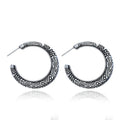 C-shaped alloy earrings with vintage engraving in bronze or silver colour options