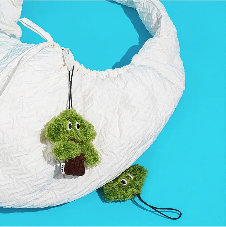 Pine tree shaped cat toy with cat mint element hanging for interactive play