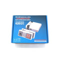 NES 8-bit retro game console with two controllers and AV cable on packaging