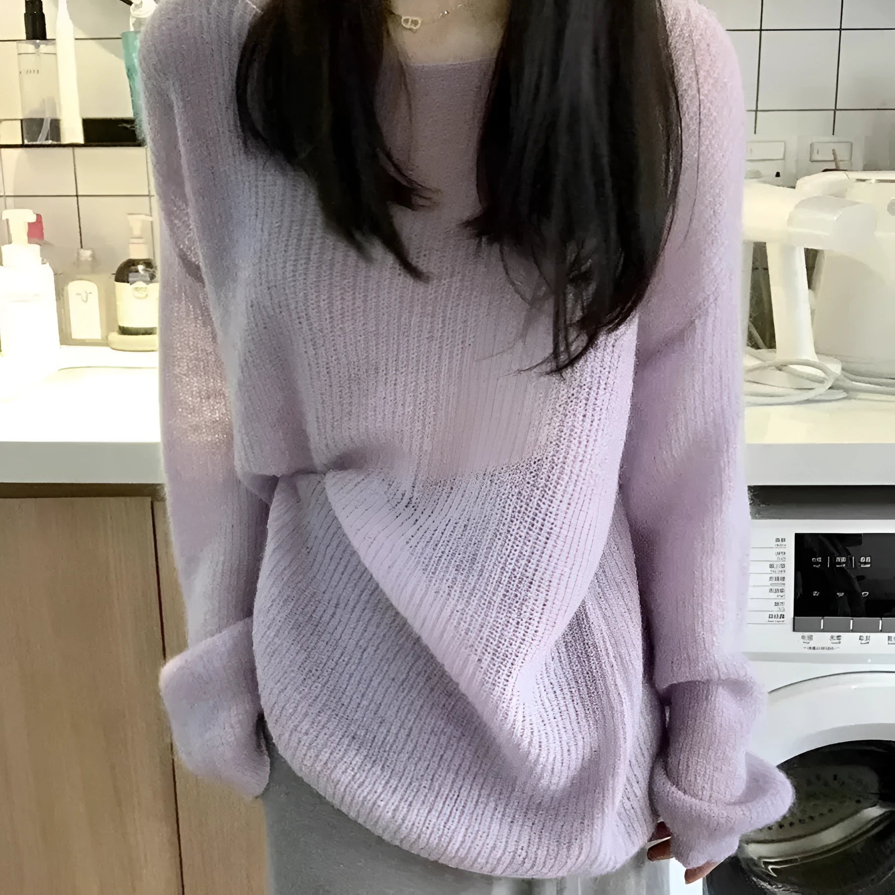 Purple ice silk women's blouse with hollow out detail and shoulder straps.