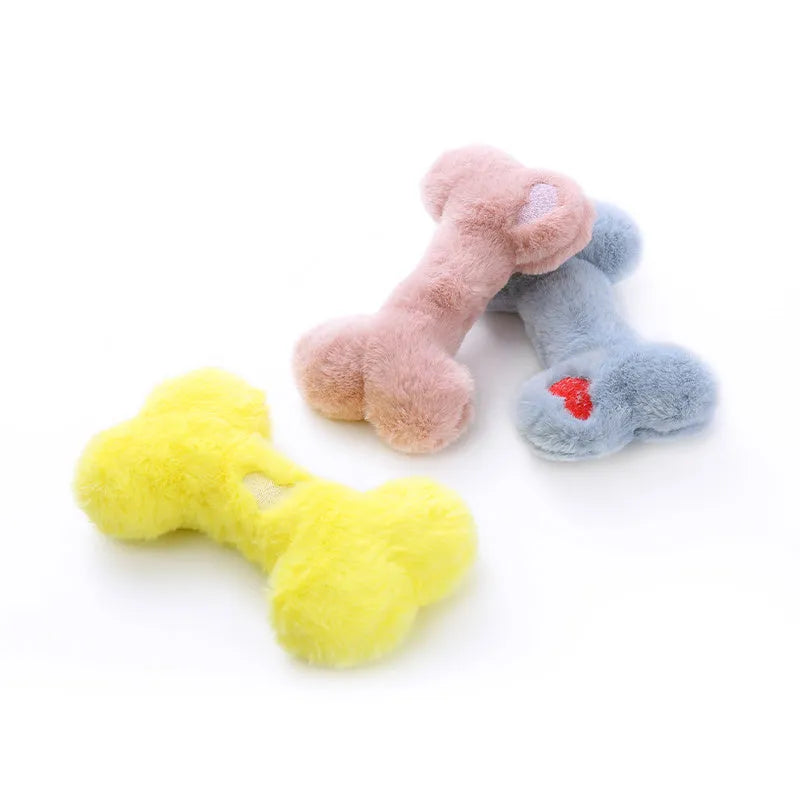 Blue love bone shaped dog plush toy with a squeaker, shown next to pink and yellow colour options.