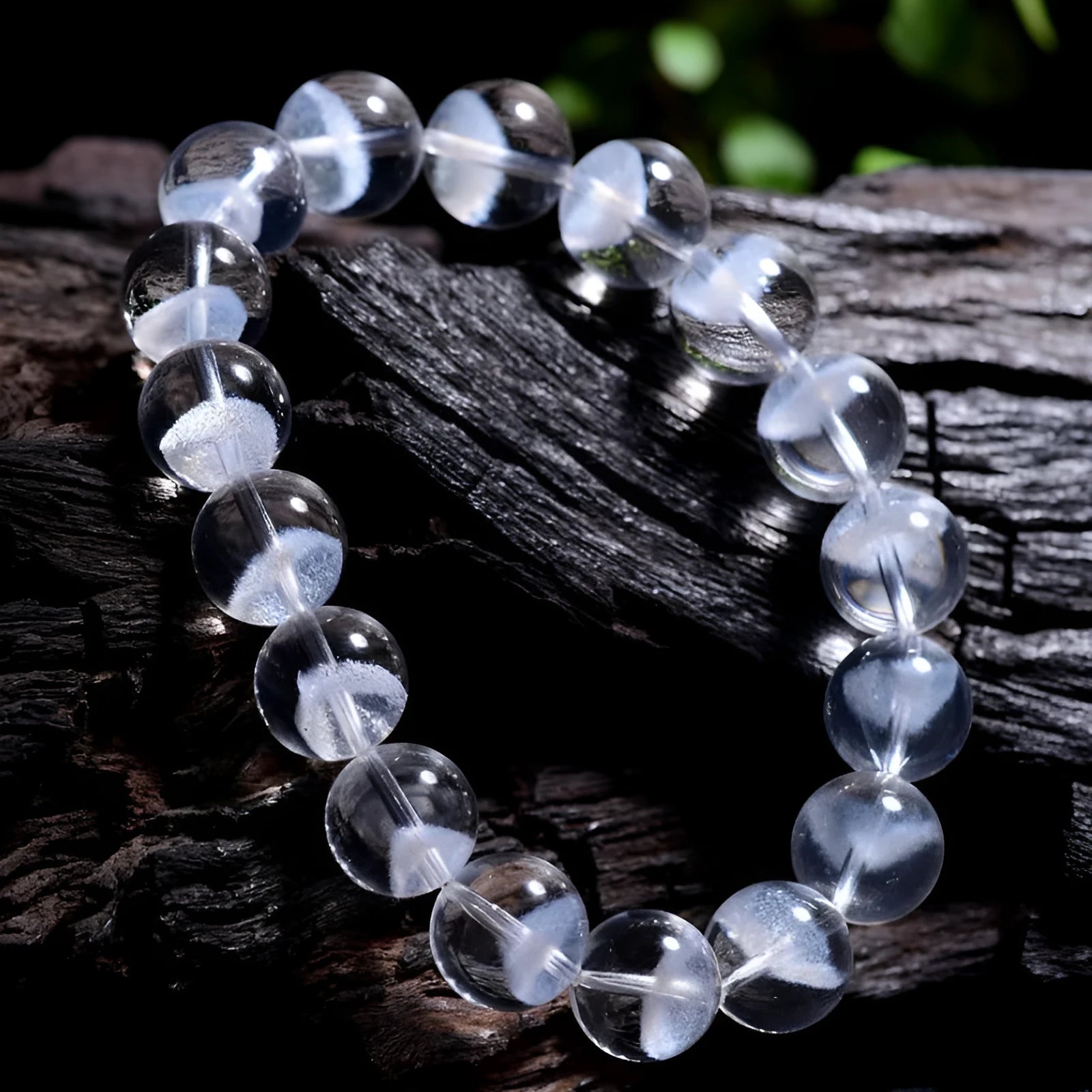 Women's white crystal pyramid bracelet with ghost detail and Ruyi design element