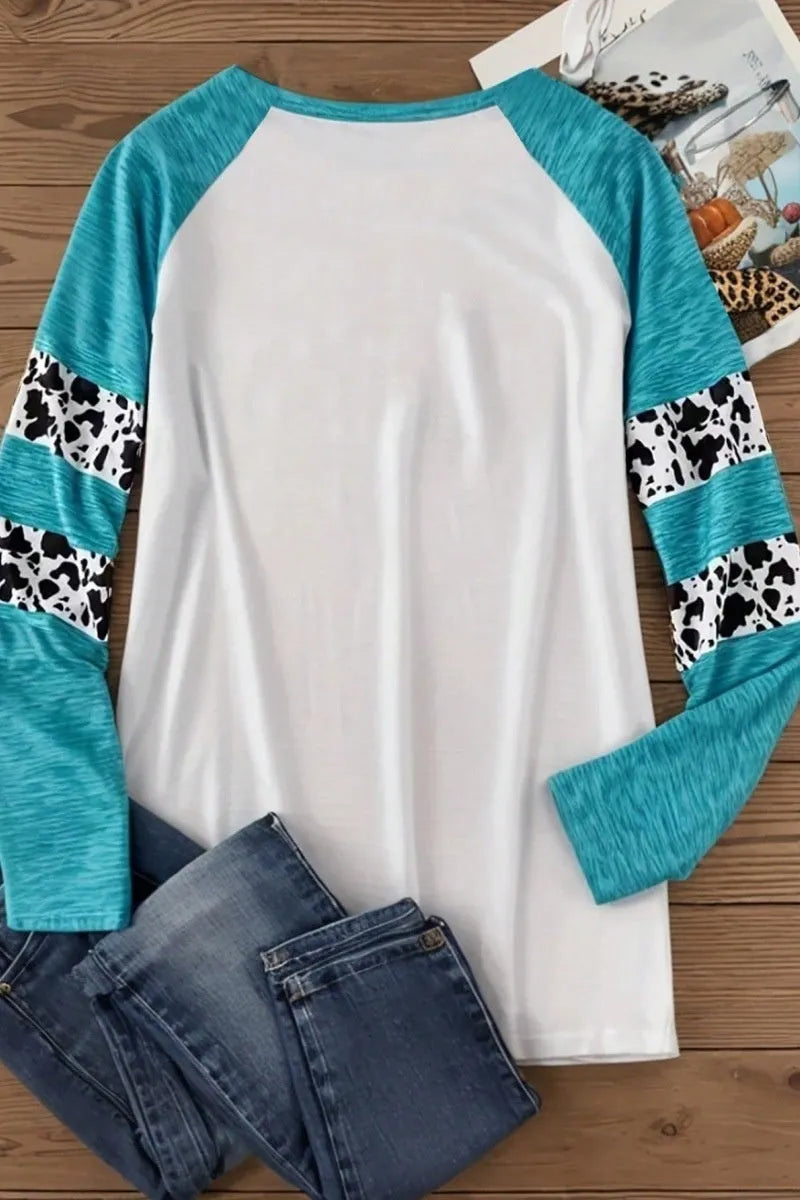 Sky blue long sleeve T-shirt with 3D digital print of a Halloween pumpkin.
