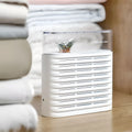 White recyclable cabinet dehumidifier box with transparent top showing colour-changing silica gel beads