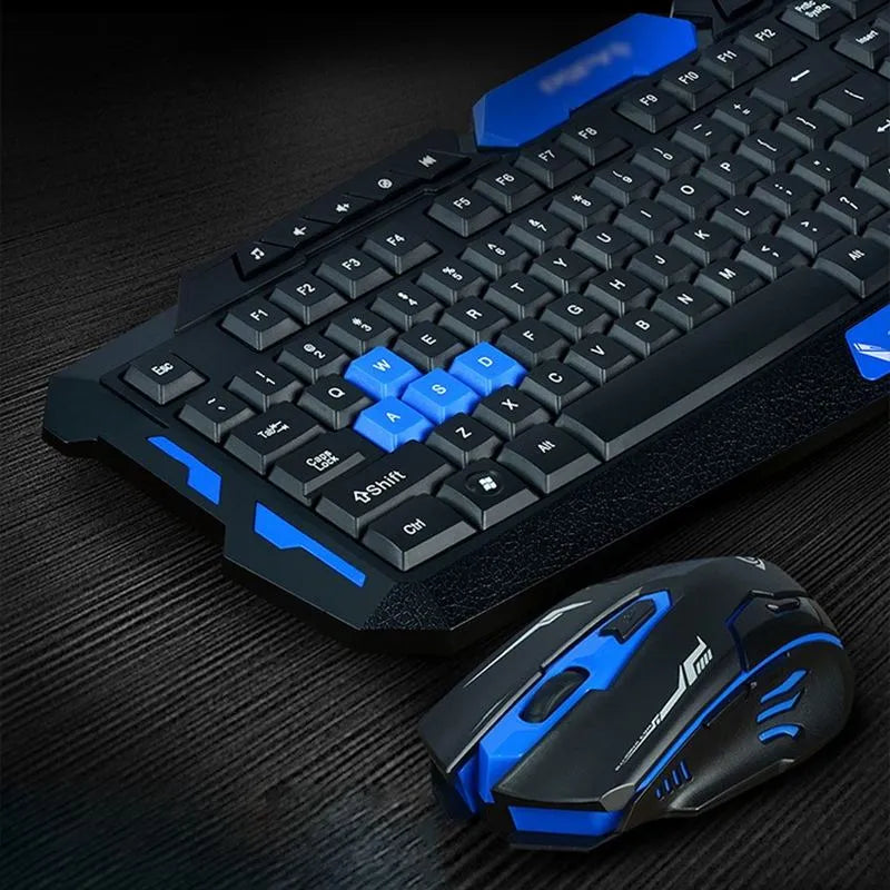 Black and blue wireless keyboard and mouse set on desk