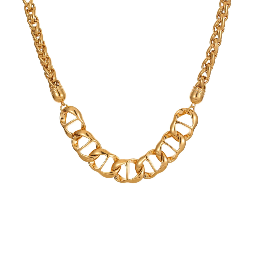 Stainless steel geometric pendant necklace with gold plating on a regular chain.