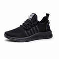 Men's black casual sports shoes with flying three bars stripe pattern and cross strap details on a white background.