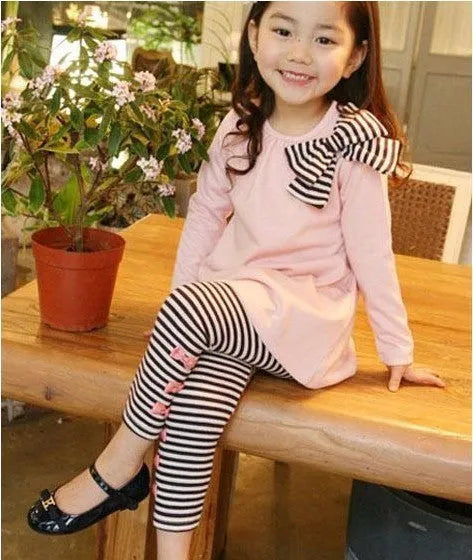 Girl's pink cotton clothing set showing size options from 110cm to 140cm