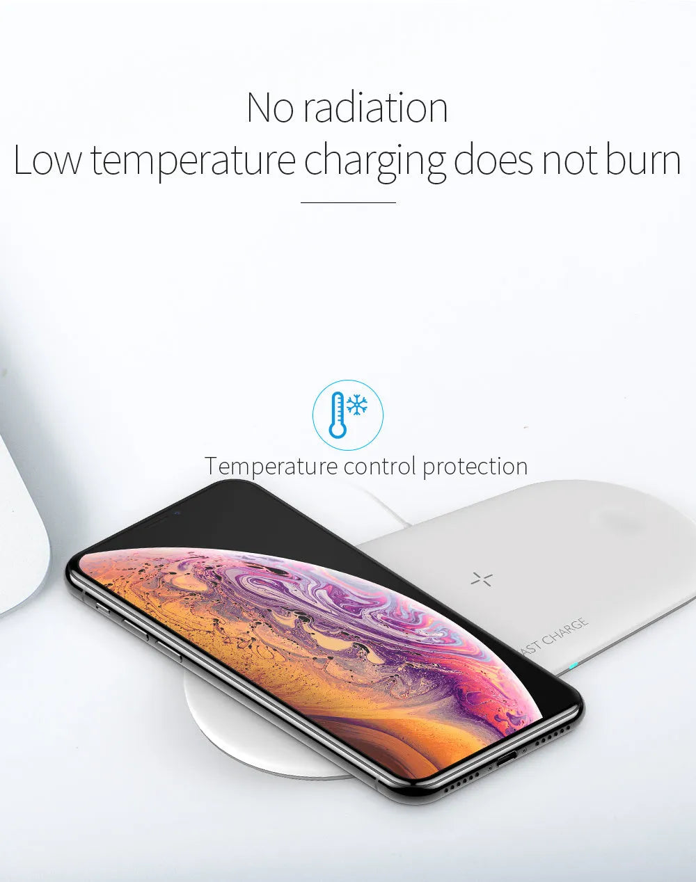 Black three-in-one wireless charging dock for iPhone, Apple Watch and wireless earbuds on a desk