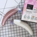 Rose gold and white electric blackhead suction device for face and nose pore cleansing.