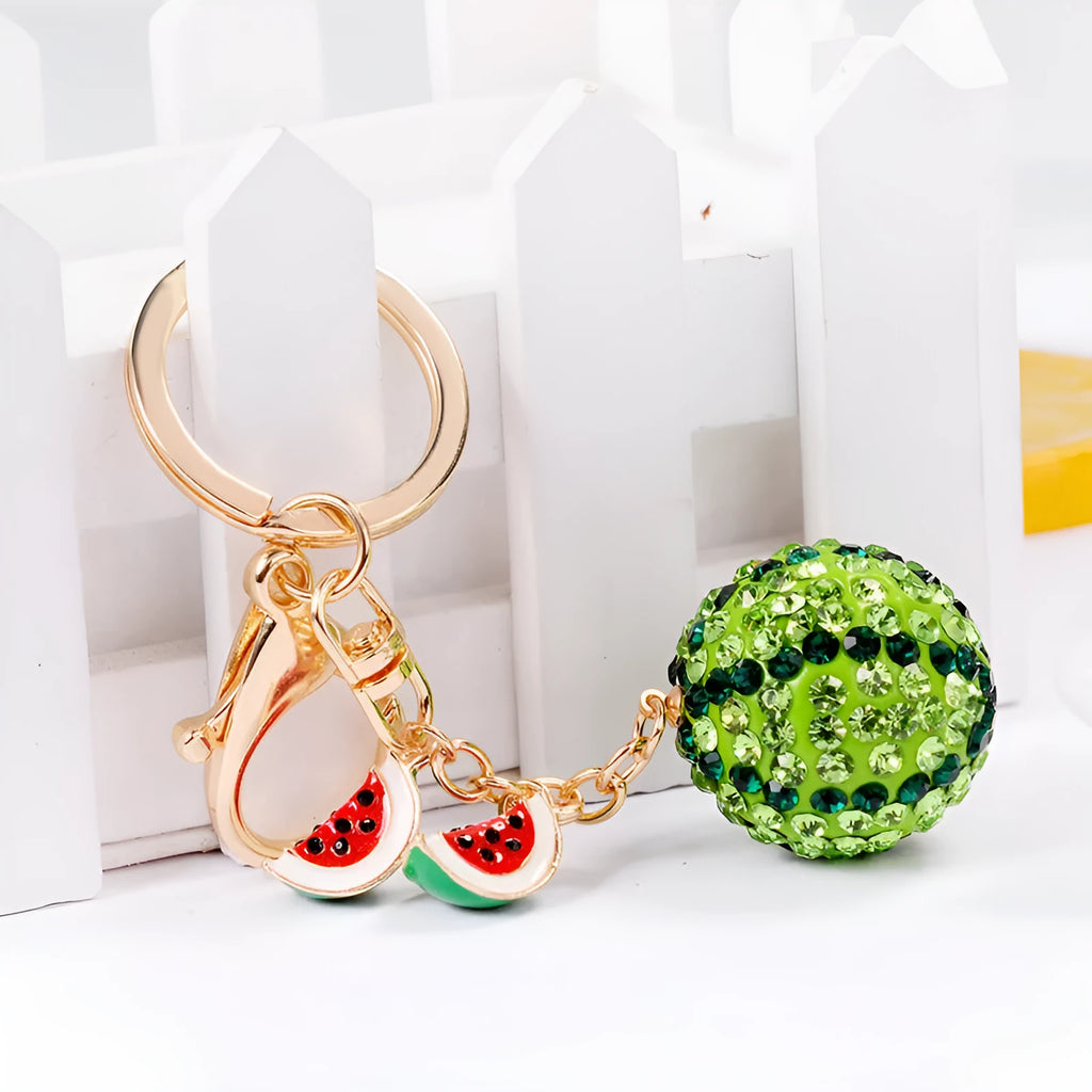 Green watermelon-shaped zinc alloy keychain measuring 12 cm in length