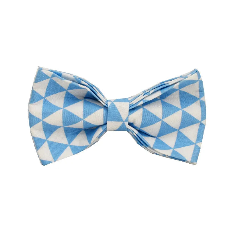 Blue four-piece dog clothing set showing vest, collar, lead and bow accessory in adjustable sizes from XS to XL