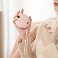 Green, pink or white portable power bank with digital display and integrated hand warmer function