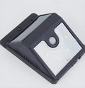 Solar-powered outdoor LED security light with six adjustable panels and stainless steel mounting bracket
