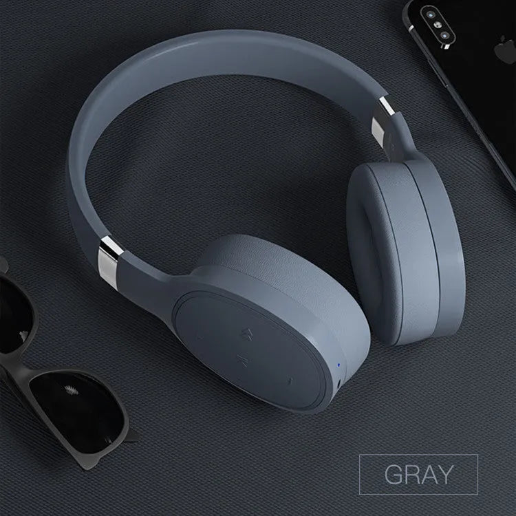 Wireless Bluetooth headset in Black, Blue, Grey, or White colour options showing over-ear design.