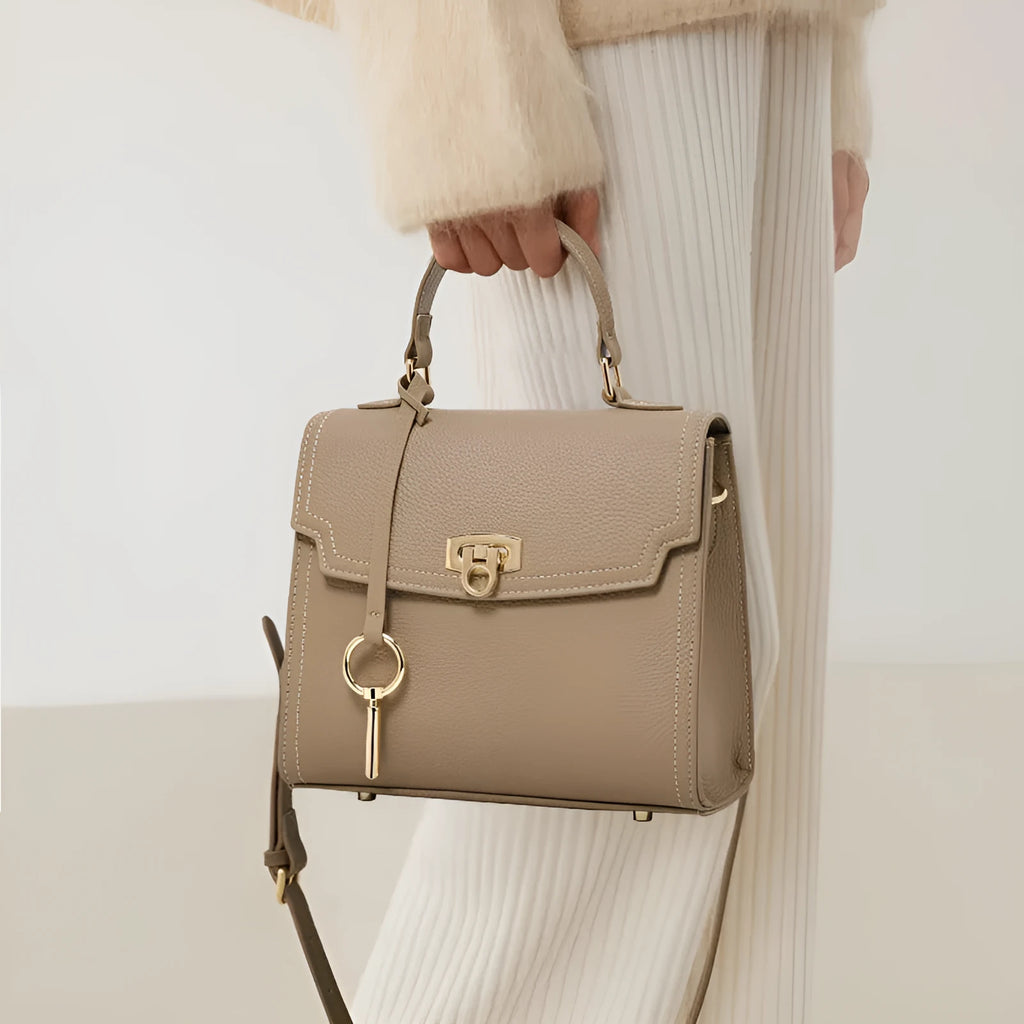Elephant grey genuine leather crossbody bag with vintage lock and litchi pattern showing square vertical design