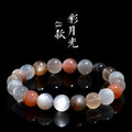 Natural colourful moon light moonstone duobao bracelet with 8mm beads on an adjustable band.