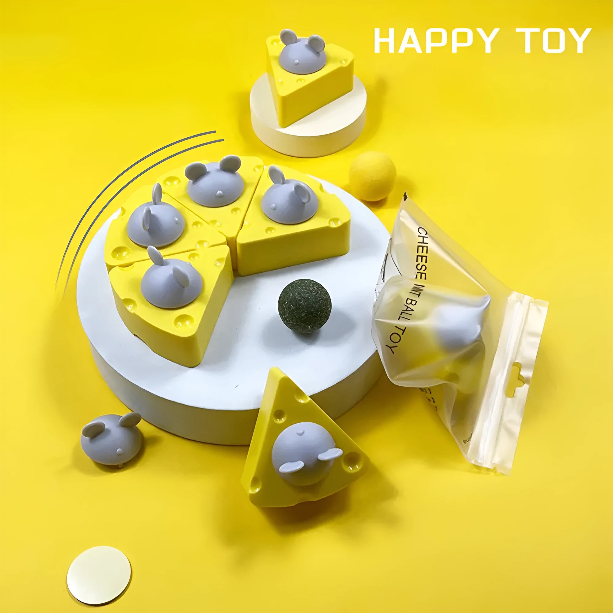 Yellow catnip toy ball with silvervine and a natural cheese flavour, includes a cat stick and wall treat holder.